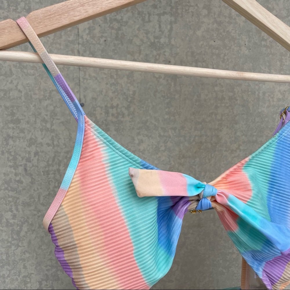 One-piece swim suit in pastel colors